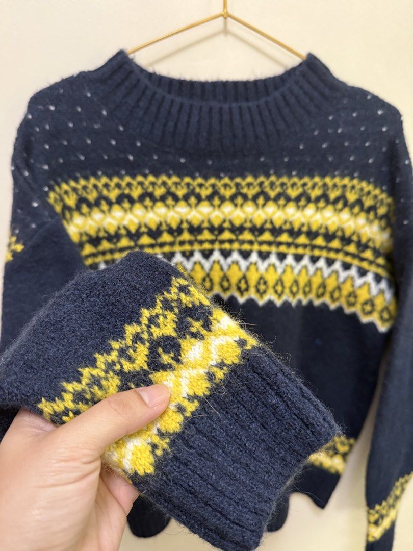GU Uniqlo Sweater - Navy Blue (Category: Coats, Jackets and Outerwear) located in Manila. Submitted by morningthrifters (Listing ID 1422153185, Image 2). Description: - Navy blue sweater - Fair isle pattern (yellow & white) - Mock neck - Long sleeves - Brand: GU - Size: M - Soft, wool blend - Good as new.