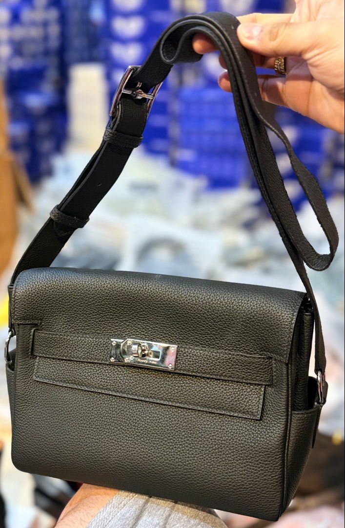 Hermes messenger bag (Category: Luxury Bags & Wallets) located in Manila. Submitted by thebodega88 (Listing ID 1422142290, Image 1). Description: -Hermes shoulder bag - Black textured leather - Silver-tone clasp - Adjustable long strap - Brand: "Hermes - Paris" SLIGHTLY USE REAL TOGO LEATHER.