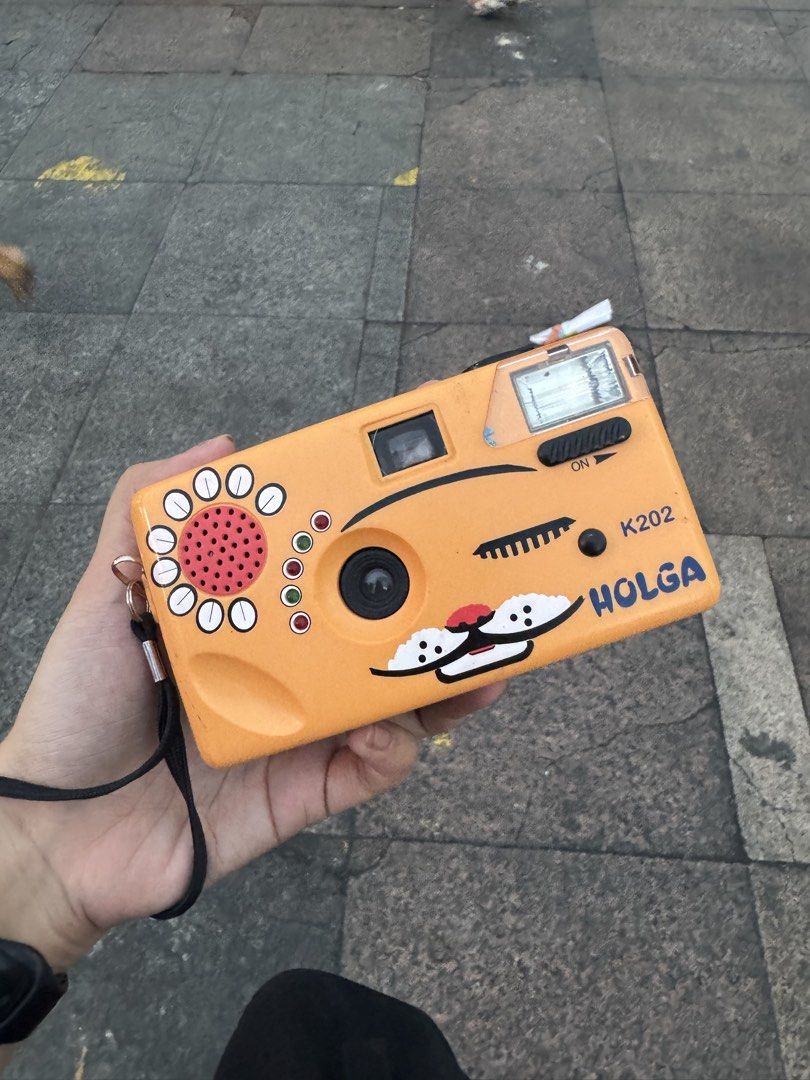 Holga K202 Camera (Category: Cameras) located in Las Pinas. Submitted by nmordanoso (Listing ID 1422110845, Image 1). Description: - Holga K202 camera - Flash not working - Good for day tome - Fixed lens - Includes wrist strap - I can send sample shots.