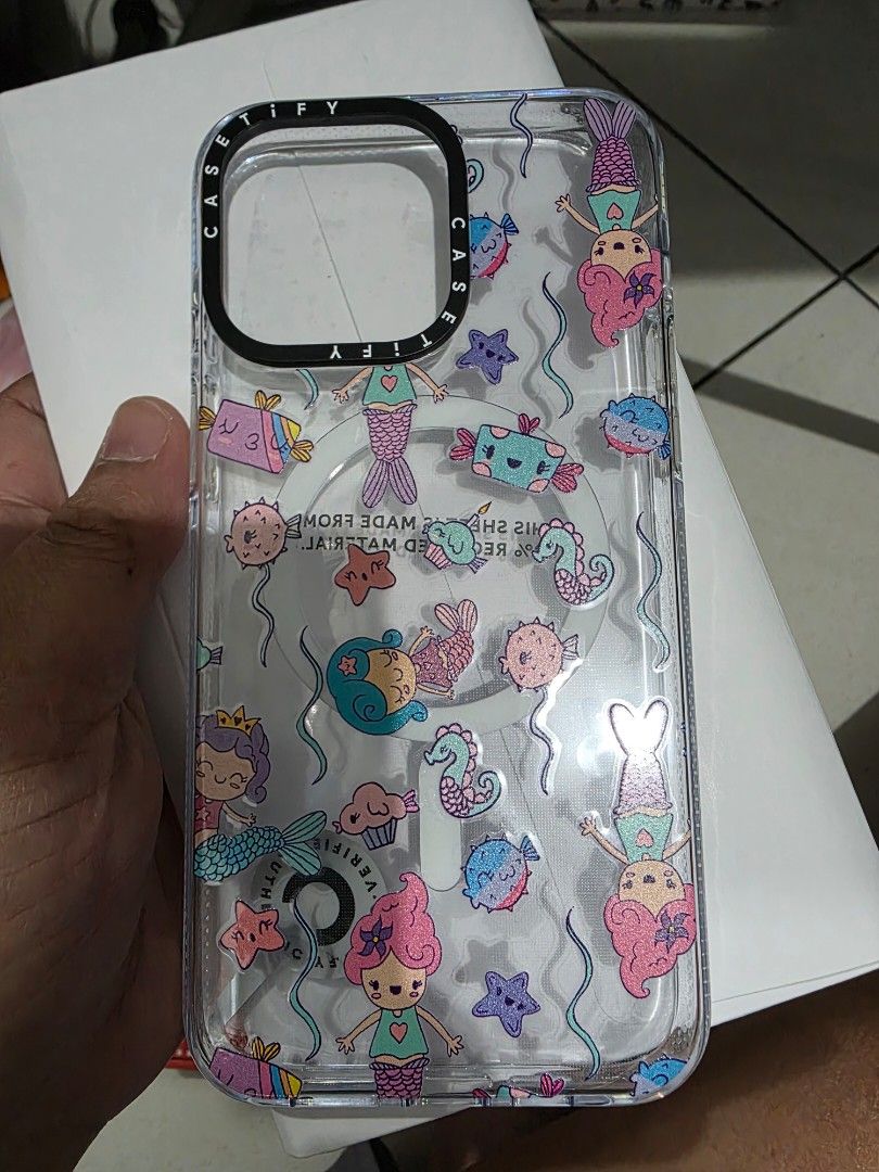 Iphone 15 pro max - Casetify Mermaid Phone Case (Category: Cases & Sleeves) located in Manila. Submitted by ladykis (Listing ID 1422223769, Image 1). Description: - Clear phone case with mermaid and sea creature design - Transparent design with colorful illustrations - Casetify brand.