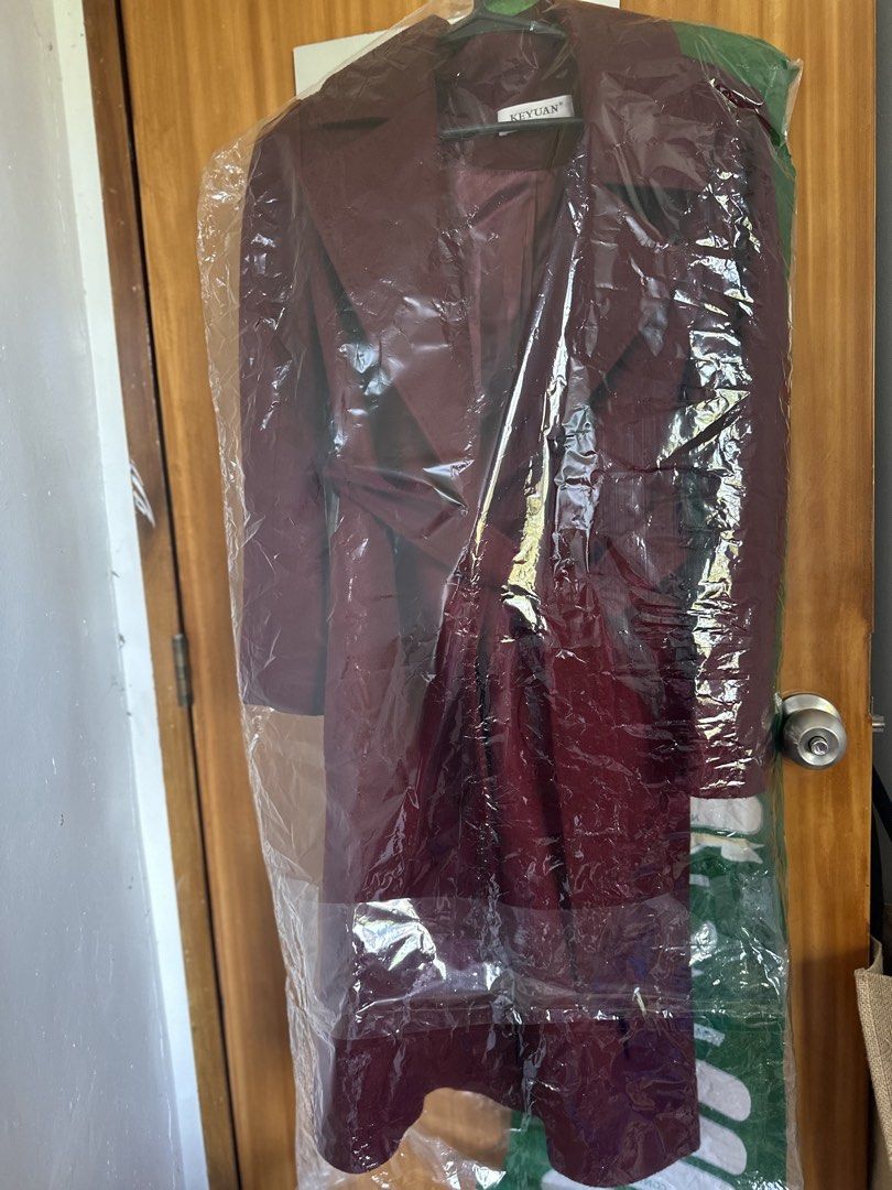 KEYUAN Burgundy Coat with Belt (Category: Coats, Jackets and Outerwear) located in Cainta. Submitted by laazzz (Listing ID 1422089151, Image 2). Description: - KEYUAN burgundy coat - Classic design - Features a tie belt - Long sleeves - Notched collar - Two front pockets - Comes in a protective plastic cover - READY TO WEAR, FRESHED FROM DRY CLEAN..