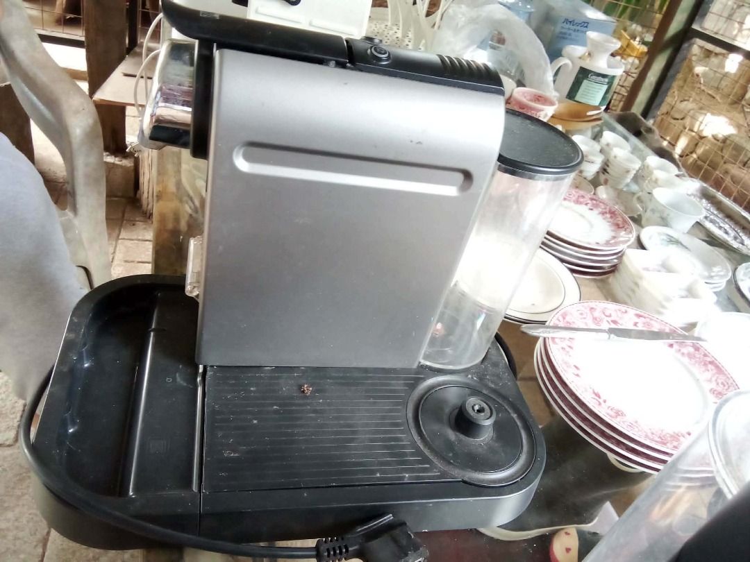 Krups Coffee Machine (Category: Coffee Machines & Makers) located in Calamba. Submitted by jomariacri08453 (Listing ID 1422148372, Image 1). Description: Features a silver and black design with a water reservoir. Includes a drip tray and a power cord. Perfect for making your favorite coffee at home. - MISSING STAINLESS DRIP TRAY - MISPLACED MILK FROTHER NA DAPAT NAKALAGAY SA SIDE KAYA I'M SELLING THIS LOW BUT STILL WORKING - FROM GERMANY - NEEDS 