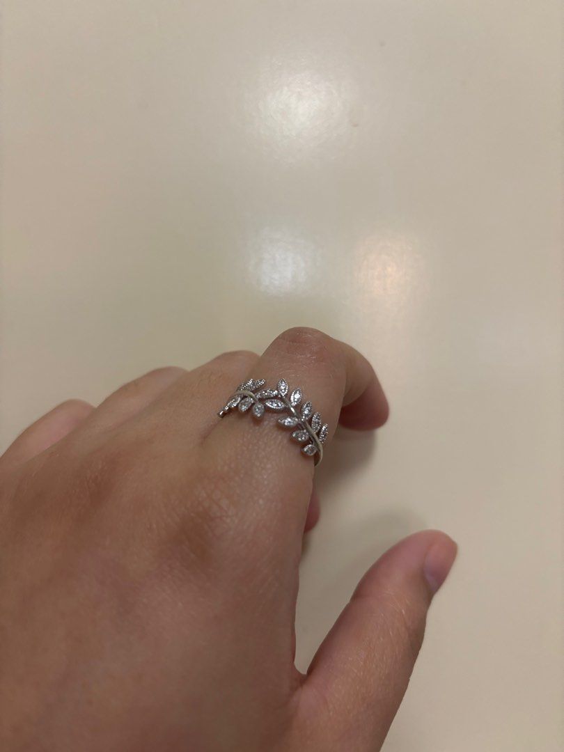Leaf Design Ring with Crystals (Category: Rings) located in Manila. Submitted by jrlua (Listing ID 1422147757, Image 2). Description: - Silver ring - Features a delicate leaf design - Adorned with sparkling crystals - Stylish accessory for any occasion.
