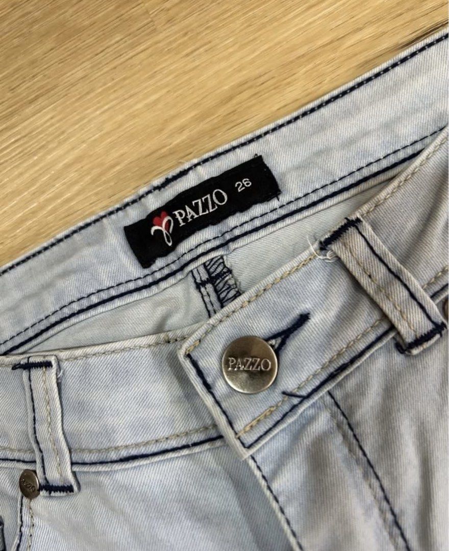 Light Wash Low-Waist Jeans (Category: Jeans) located in Binan City. Submitted by supanovaaa (Listing ID 1422134231, Image 2). Description: - Light wash jeans, Slim fit, Mid-waist - Size 26, Length: 31" - 2 front + 2 back pockets - Button closure with PAZZO logo - Visible stitching details.
