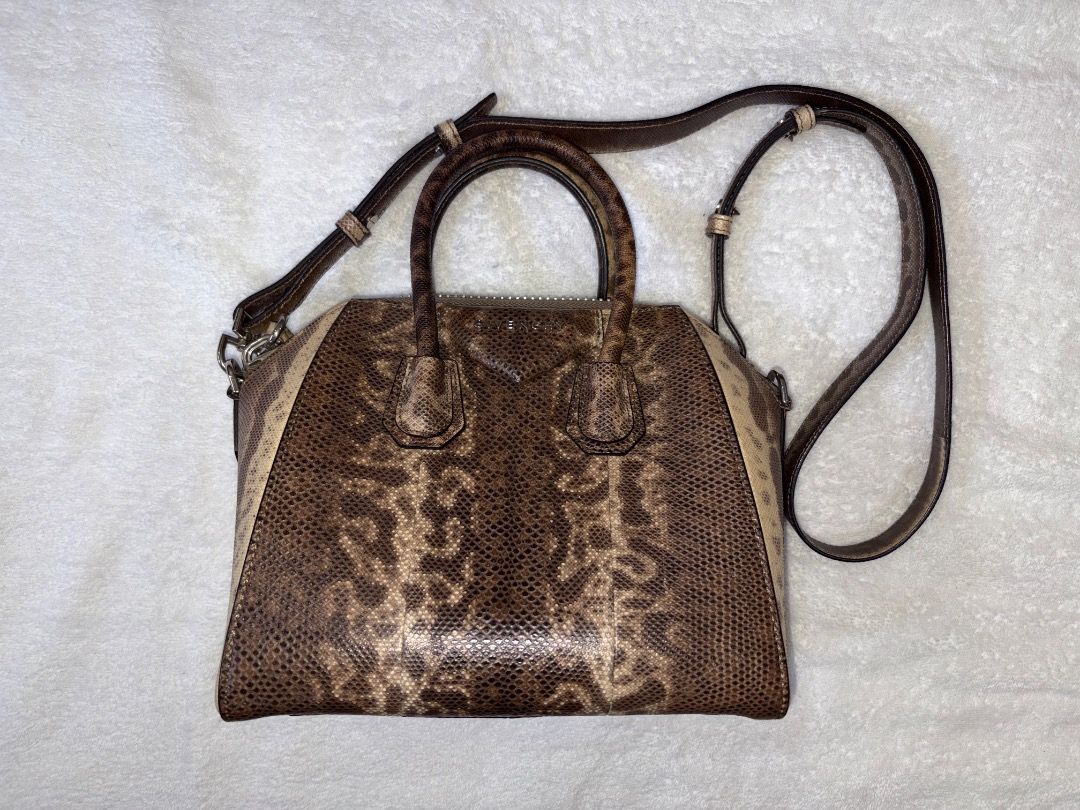 Lizard Skin Handbag with Top Handle (Category: Luxury Bags & Wallets) located in Tagaytay City. Submitted by kyle870 (Listing ID 1422152516, Image 1). Description: - Lizard Skin - Top handle and detachable shoulder strap - Brown and beige color scheme - Main compartment and smaller pocket - Structured shape - Genuine leather construction can do meetup around Cavite/Manila.