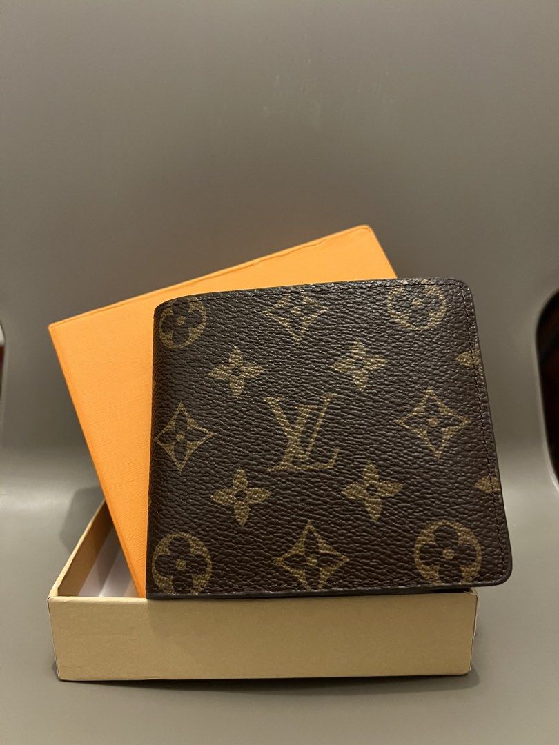 Louis Vuitton Mens Wallet Monogram (Category: Luxury Bags & Wallets) located in Pateros City. Submitted by djsunoiii (Listing ID 1422097013, Image 3). Description: Brandnew Louis Vuitton Wallet Monogram Canvas Bifold Highlights brown monogram pattern embossed logo multiple card slots note compartment compact design Composition Outer: PVC 100%, Canvas 100%, Leather 100% Complete with Box and Card.