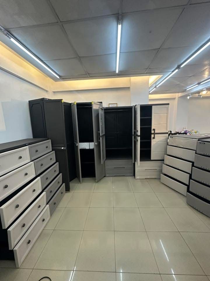 Megabox Plastic Cabinet and Drawer Set (Category: Shelves, Cabinets & Racks) located in Pasig City. Submitted by gammad_05 (Listing ID 1422129561, Image 1). Description: Durable Megabox plastic cabinets and drawer sets available. Various sizes and configurations are shown, including cabinets with shelves and drawers. Some units have multiple drawers. Available colors include beige and gray .Perfect for organizing clothes, accessories, or other it