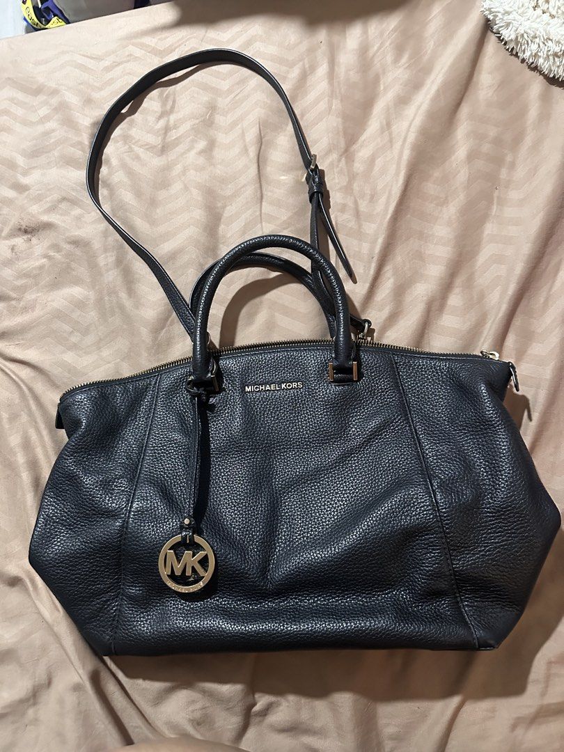 Michael Kors Black Riley Bag (Category: Cross-body Bags) located in Quezon City. Submitted by decluttertherapymnl (Listing ID 1422221961, Image 1). Description: - Authentic Michael Kors Riley Satchel bag - Black - Top handle and detachable shoulder strap for versatility -MK Logo Gold Tone - Zipper Closure RFS: Decluttering Pasig Area Payment online or upon pick up.