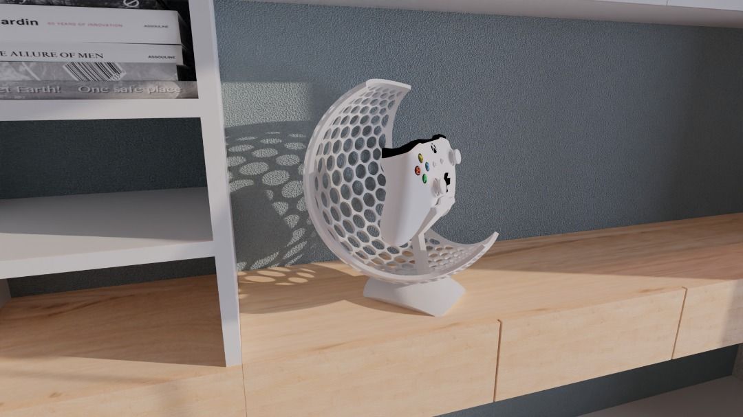 Modern Hive Moon Controller Stand | Universal PS5 & Xbox Holder | Sleek White (Category: Controllers) located in Mandaluyong City. Submitted by heyitslaaaance (Listing ID 1422118220, Image 3). Description: Elevate your gaming station with this Modern Hive Moon Controller Stand. Featuring a unique, geometric honeycomb pattern in a crescent moon shape, this stand is designed to turn your controller into a display piece when you're not playing. It p