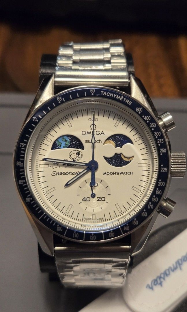 MoonSwatch metal MOD snoopy "cold moon" (Category: Luxury Watches) located in Quezon City. Submitted by xtiany93 (Listing ID 1422177170, Image 1). Description: - Omega x Swatch Speedmaster Moonswatch MOD using rep internal movement para affordable - white dial, mission to earthphase moonshine cold moon gold snoopy - comes in all metal case with white rubber moonswatch bracelet and steel bracelet pag hindi tumawad, (pag tumawad, pick 1 bracelet on