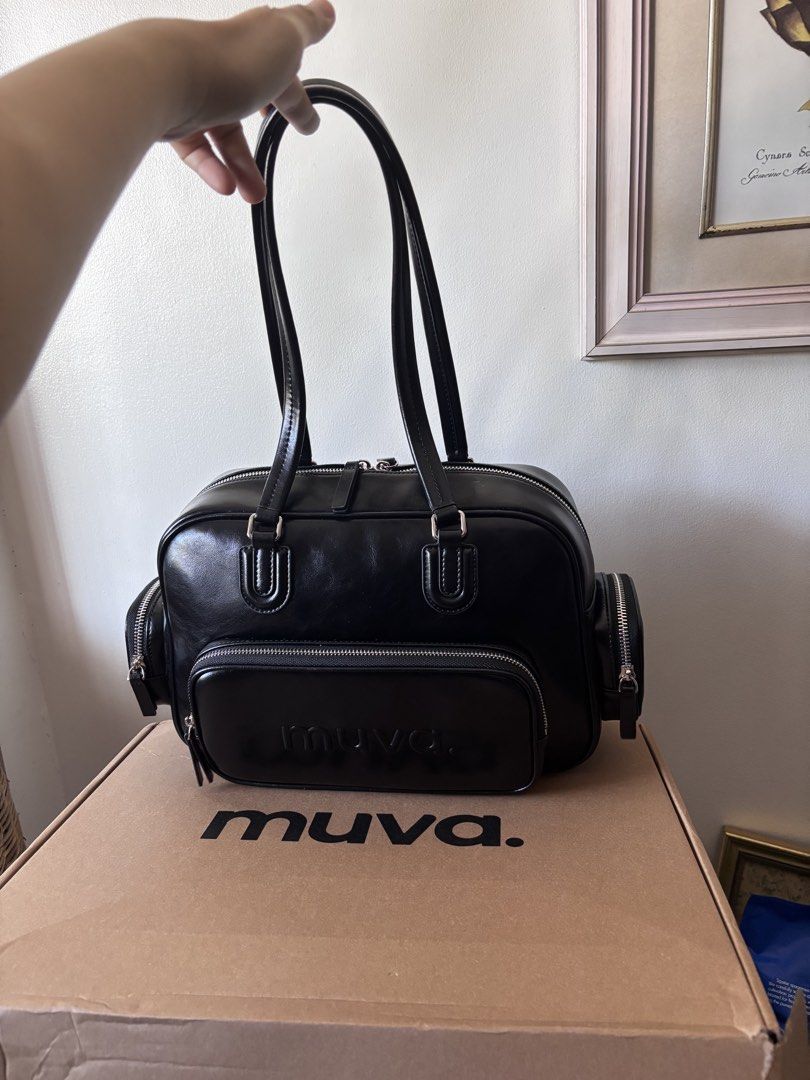 Muva Slpit cow leather bag (Category: Luxury Bags & Wallets) located in Cebu City. Submitted by aryssscloset (Listing ID 1422094471, Image 3). Description: Muva Split Cow Leather Bag Large capacity Super pretty, can fit a lot of things Office bag / panglaag bag / diaper bag Pls check photos for the bag size Brand new Selling for 3000 Cebu based Loc: mandaue Can meet up sm jmall.
