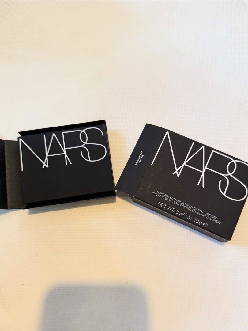 Brandnew NARS Light Reflecting Setting Powder authentic (Category: Makeup) located in Antipolo. Submitted by decluttering.shopph (Listing ID 1422201245, Image 1). Description: NARS Light Reflecting Pressed Powder ✨ Brand new, bought in HK 2026, - NARS Light Reflecting Setting Powder - Pressed powder - Net weight: 0.35 Oz / 10 g - Comes in a black box with white lettering - Product name and details printed on the box.