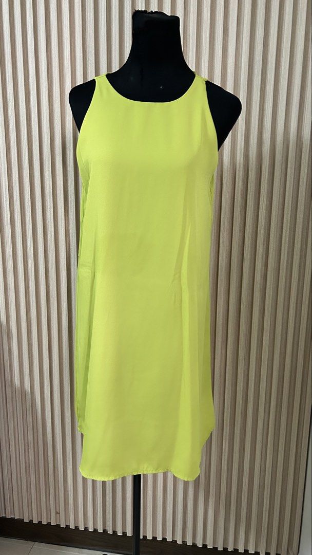Neon Green Sleeveless Dress (Category: Dresses) located in Cainta. Submitted by ishatglav (Listing ID 1422228401, Image 1). Description: - Neon green sleeveless dress - Round neckline - Straight, relaxed fit - Knee-length - Lightweight fabric - Ideal for warm weather - Versatile style.