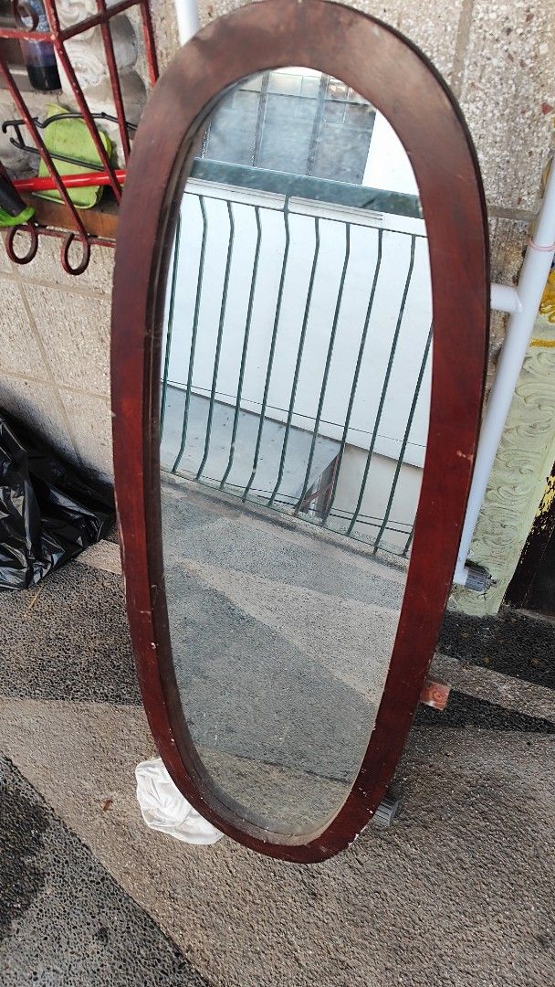 Oval Wall Mirror (Category: Other Home Furniture) located in Quezon City. Submitted by jmpaulite (Listing ID 1422144728, Image 2). Description: - Oval wall mirror - Wooden frame - Classic design - H 115cm (mirror only) - W 40cm (mirror only) .
