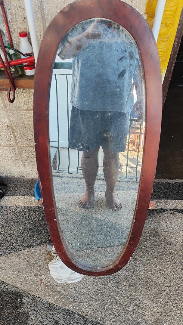 Oval Wall Mirror (Category: Other Home Furniture) located in Quezon City. Submitted by jmpaulite (Listing ID 1422144728, Image 3). Description: - Oval wall mirror - Wooden frame - Classic design - H 115cm (mirror only) - W 40cm (mirror only) .