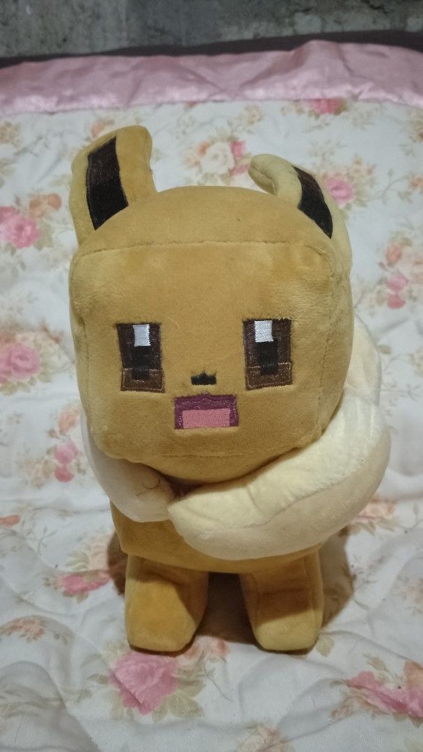 Pokemon Center Eevee Plush Toy (Category: Plushies & Soft Toys) located in General Trias. Submitted by ninicflors (Listing ID 1422217435, Image 1). Description: - Authentic Pokemon Center Eevee plush - Unique pixelated design - Comes with original tags RFS: Need hospital funds.