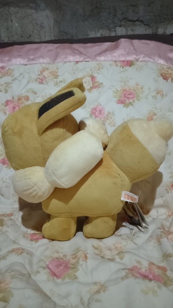 Pokemon Center Eevee Plush Toy (Category: Plushies & Soft Toys) located in General Trias. Submitted by ninicflors (Listing ID 1422217435, Image 2). Description: - Authentic Pokemon Center Eevee plush - Unique pixelated design - Comes with original tags RFS: Need hospital funds.