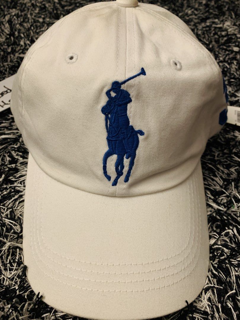 POLO RALPH LAUREN BIG LOGO| White Cap (Category: Caps & Hats) located in Taguig. Submitted by brandedandqualityitemsph (Listing ID 1422153541, Image 3). Description: 🔺️READING IS ESSENTIAL, THANK YOU🔺️ 💯AUTHENTICITY GUARANTEED💯 🔥SUPER SALE🔥 RALPH LAUREN BIG LOGO DAD HAT BRAND NEW WITH TAG Bought in Indonesia White in color Blue Logo and 3 Embroidered Big Logo Polo - Front - not printed or rubberized Embroidered number 3 - Side - not printed