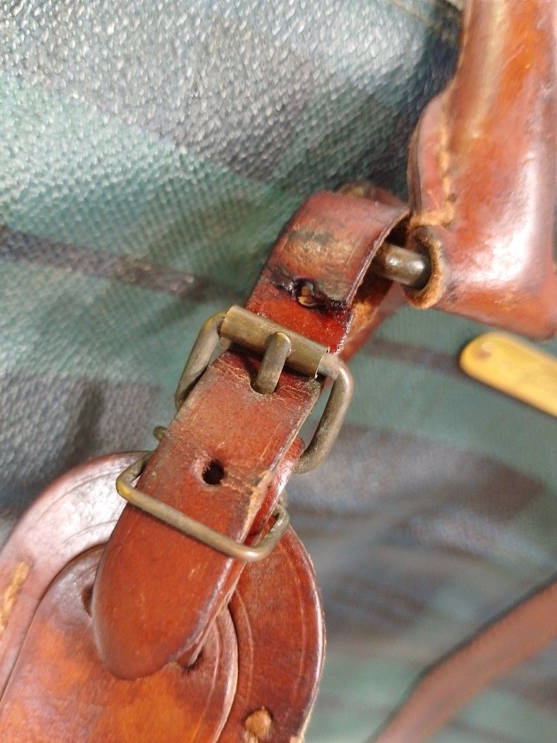 Polo Ralph Lauren Plaid Duffle Bag (Category: Luxury Bags & Wallets) located in Manila. Submitted by decorasyon (Listing ID 1422140023, Image 3). Description: - Vintage Polo Ralph Lauren duffle bag - Classic plaid pattern - Brown leather handles, trim, and accents - Features Polo Ralph Lauren leather tag - Zipper closure - Interior pocket - Shows wear on leather and hardware.