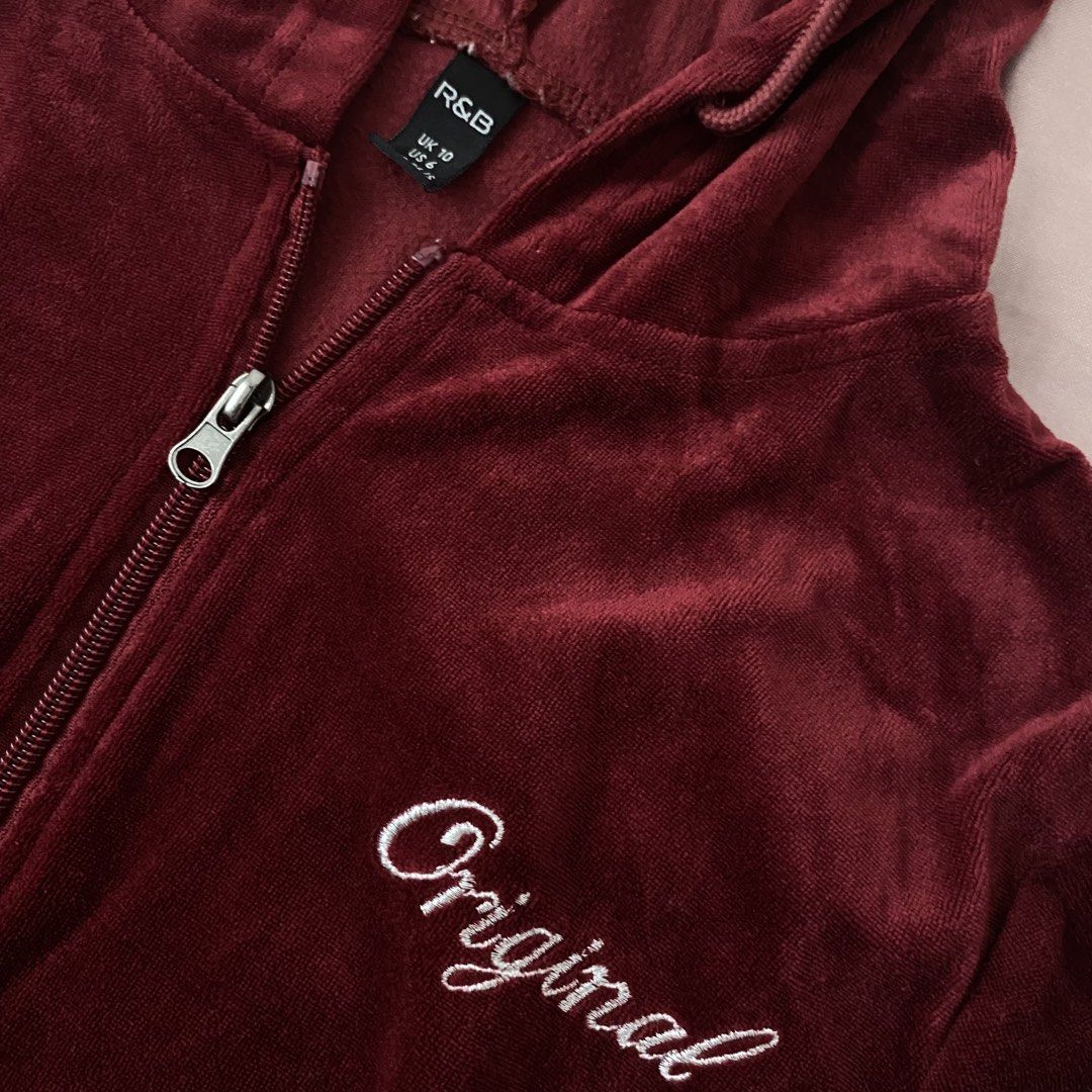 R&B Original Maroon Hoodie (Category: Coats, Jackets and Outerwear) located in Makati City. Submitted by monamichi771 (Listing ID 1422137187, Image 2). Description: - Maroon R&B zip-up hoodie - Features a hood and two front pockets - Embroidered with the word "Original" - UK size 10, equivalent to US size 6 - Made of a soft, velvety material.