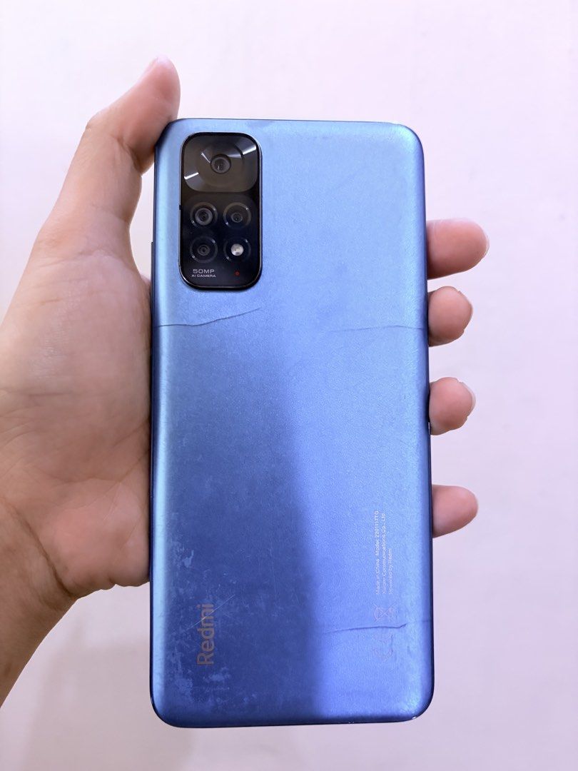 Redmi Note 11 (Category: Xiaomi) located in Caloocan City. Submitted by avlossoms.ph (Listing ID 1421500044, Image 3). Description: Original Price: P9,000 🔥 Steal the Spotlight with Redmi Note 11! 🔥 Looking for a budget phone that delivers BIG performance? 📱✨ The Redmi Note 11 is here to impress! 🌟 Why You’ll Love It: ⚡ Smooth & vibrant 90Hz AMOLED display 📸 50MP AI Quad Camera – Capture every moment in stunning detail 🔋 5000mAh battery – P