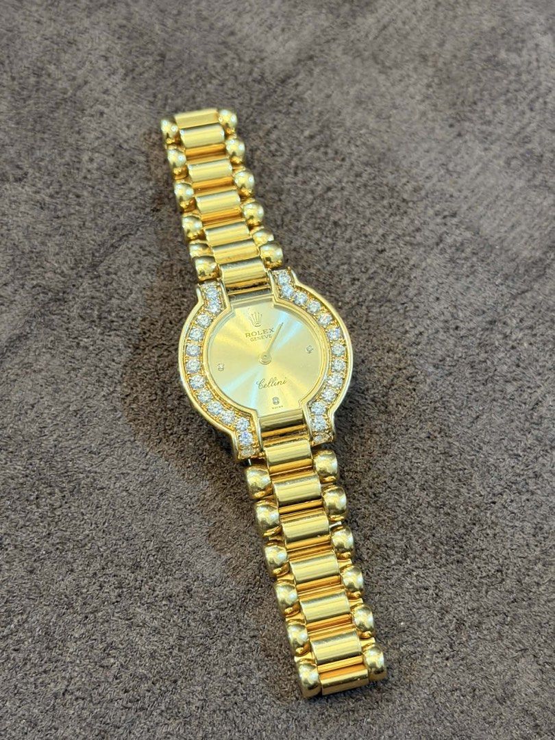 Rolex Cellini 18K Gold Diamond Watch (Category: Women's Watches) located in Imus. Submitted by juantosell777 (Listing ID 1422156489, Image 2). Description: I have an authentic Rolex Cellini watch. Features a gold dial with diamond accents around the bezel. The watch is made of 18K gold and weighs 66.57 grams. The model number is 2253, and the serial number is NG09375. The clasp is marked with "Rolex Geneve 750 Swiss Made 18K". Selling price: P815