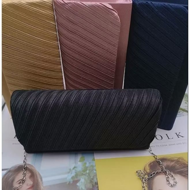 Rutched-detailed Black Clutch Bag (Category: Clutches) located in Pasay City. Submitted by declutter_j (Listing ID 1422083005, Image 1). Description: Rutched-detailed clutch bag for formal events Color: Black Condition: Like new (used once only) RFS: Decluttering, extra funds .