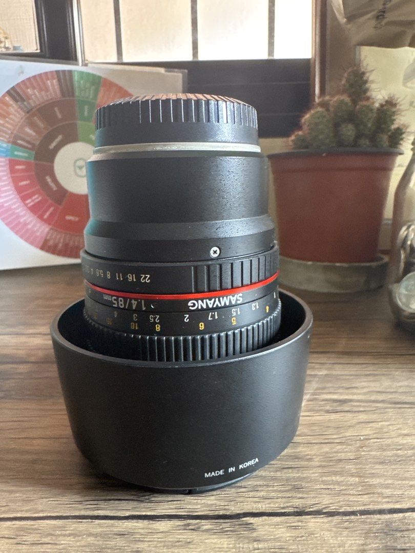 Samyang 1.4/85mm FX Mount Lens (Category: Lens & Kits) located in Manila. Submitted by yourchaiboy (Listing ID 1422128364, Image 2). Description: With box. Original lens cap and hood. Available for testing at Pilar Village. - Samyang 85mm f/1.4 FX lens AS IF UMC - Includes lens hood and lens cap - Features a red accent ring - Aperture and focus distance markings - Made in Korea .