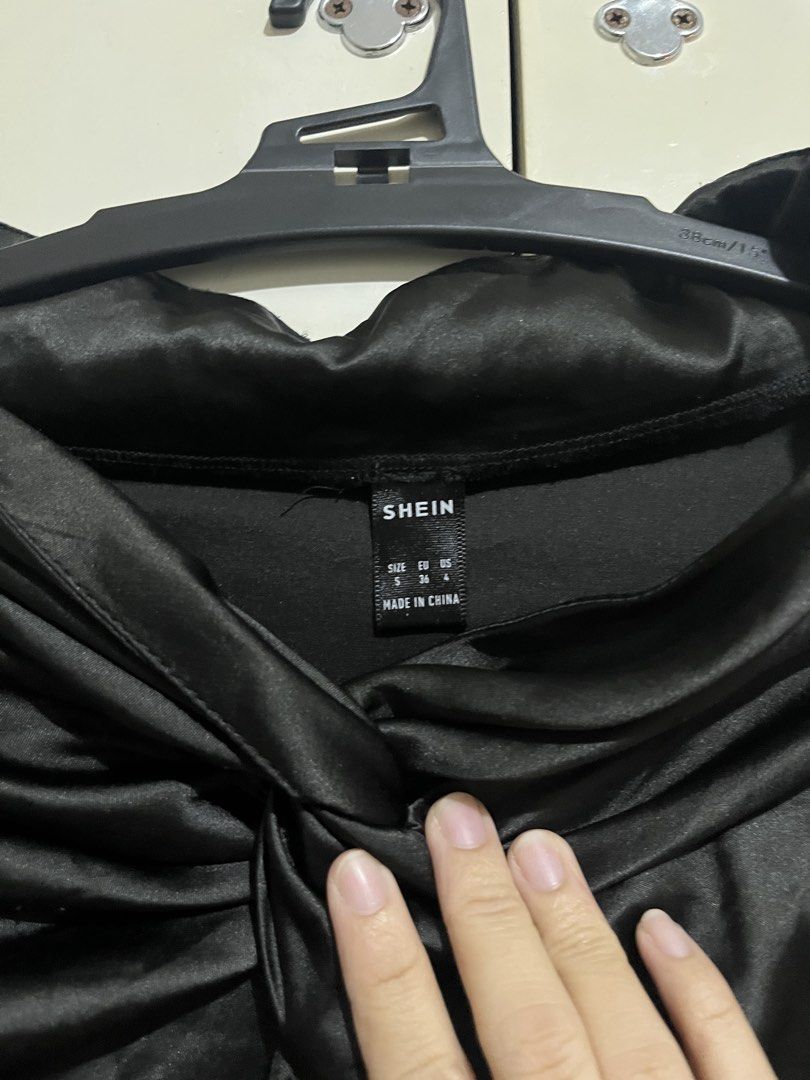 SHEIN Black Satin Skirt (Category: Skirts) located in Taytay. Submitted by jasfinds_ (Listing ID 1422166763, Image 2). Description: - SHEIN black satin midi skirt - Knot detail at waist - Good condition.