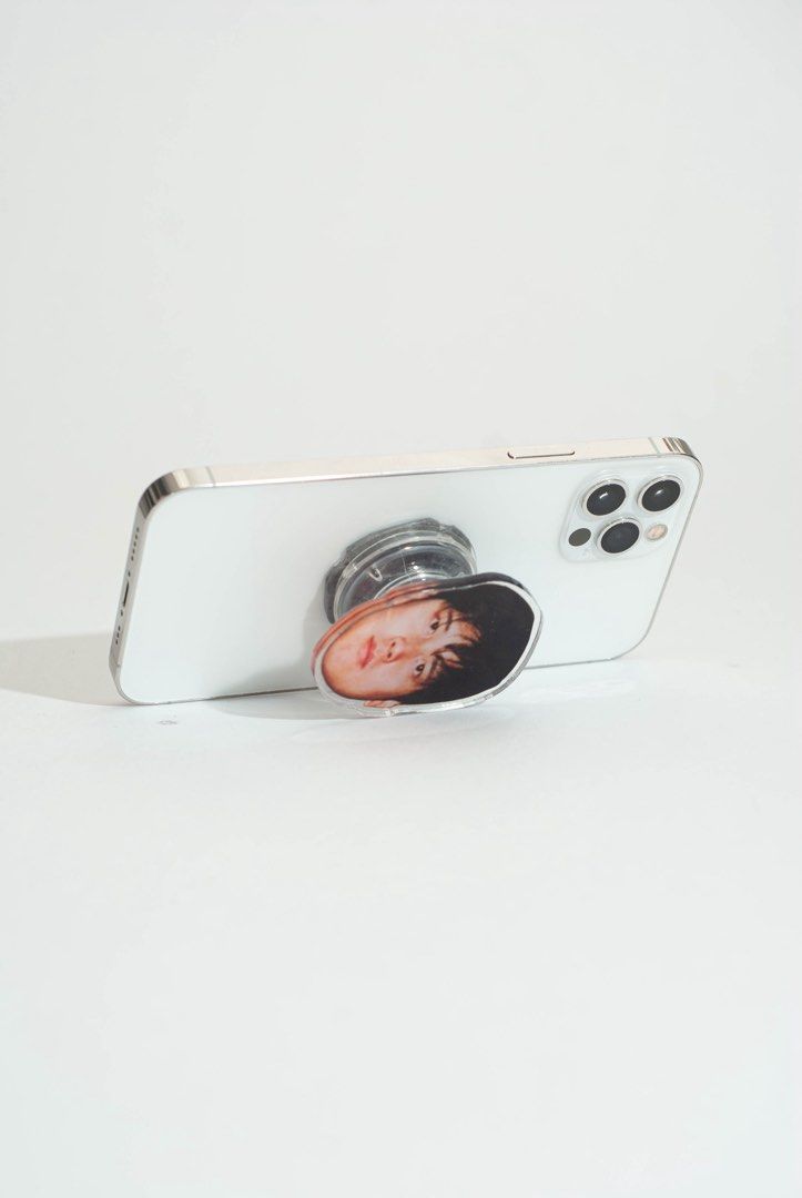 Shohei Ohtani Griptok / Popsocket (Category: Mounts & Holders) located in Quezon City. Submitted by savespaces (Listing ID 1422183788, Image 3). Description: Customized Shohei Ohtani popsockets • brand new, with protective plastics on both sides of Shohei’s face • 2 left • comes with the “airbag” hahaha • material: clear acrylic • can double as phone stand for whenever you’re binge watching Can send more photos thru chat!.