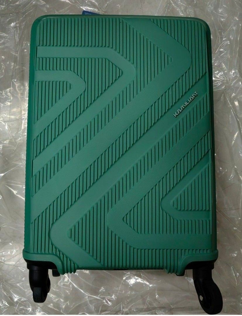 Small size Hand carry Luggage (Category: Luggage) located in Muntinlupa City. Submitted by jaz_things (Listing ID 1422159413, Image 1). Description: - authentic **Kamiliant** brand - hand carry size - hard case - swivel heels - TSA lock - unused - void warranty.