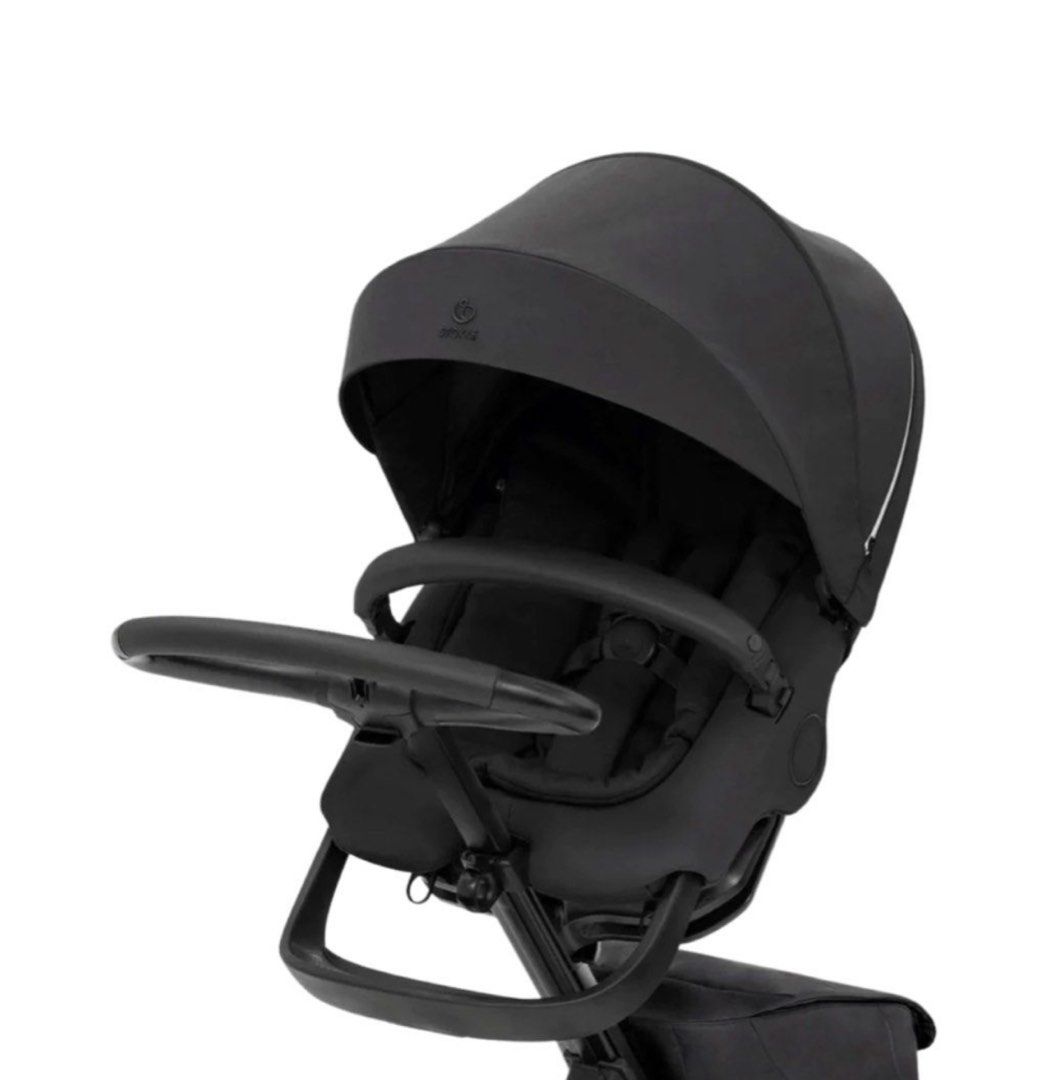 Stokke Xplory Stroller - Black (Category: Strollers) located in Taguig. Submitted by jehana_sangkula (Listing ID 1422159056, Image 3). Description: Stokke Xplory stroller features a sleek black design. It has a height-adjustable seat and a large canopy for sun protection. The stroller includes a storage bag and a comfortable seat for the child..