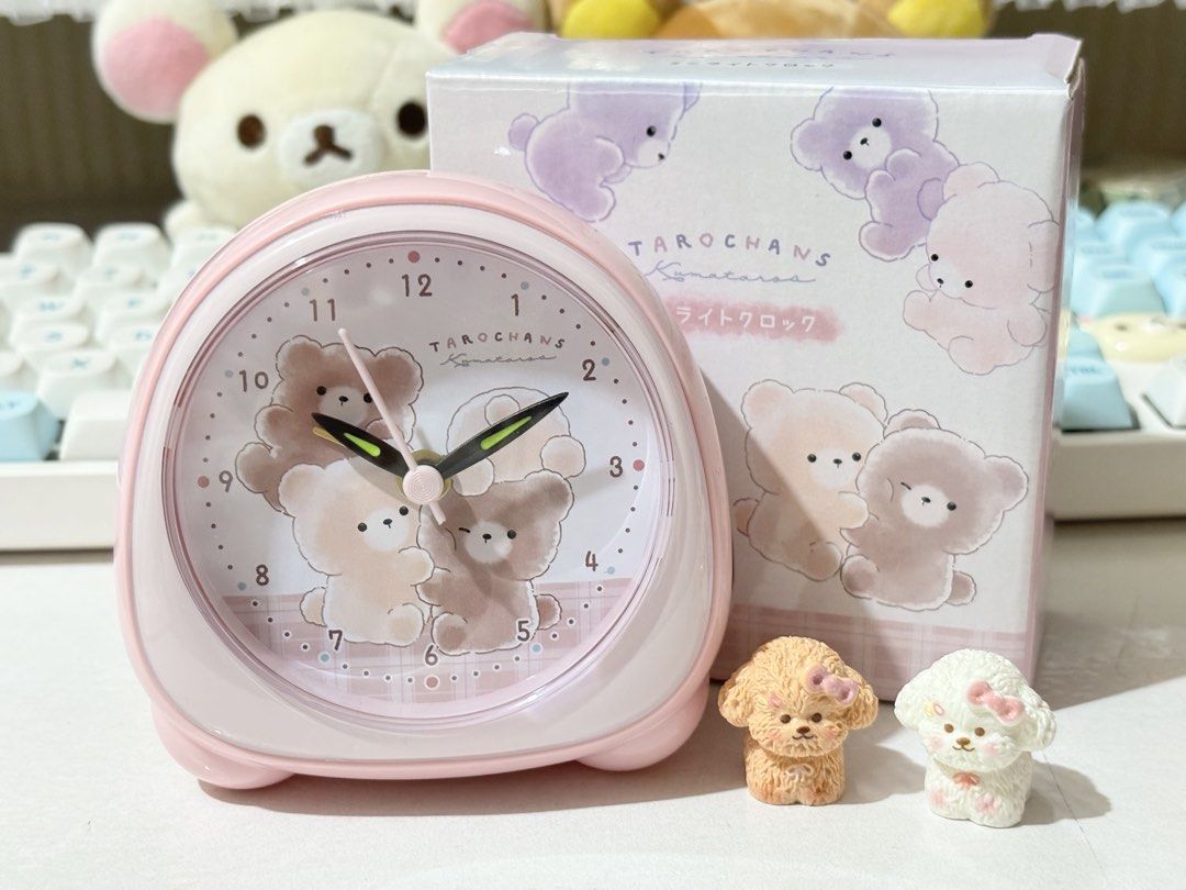 Taro Chans Alarm Clock (Category: Clocks) located in Quezon City. Submitted by ms.cherrylatte (Listing ID 1422222987, Image 1). Description: - Pink Taro Chans Komarana alarm clock - Features a cute bear design - Includes light function - Alarm and time controls on the back - Comes with original box - Perfect for bedroom decor or as a gift.