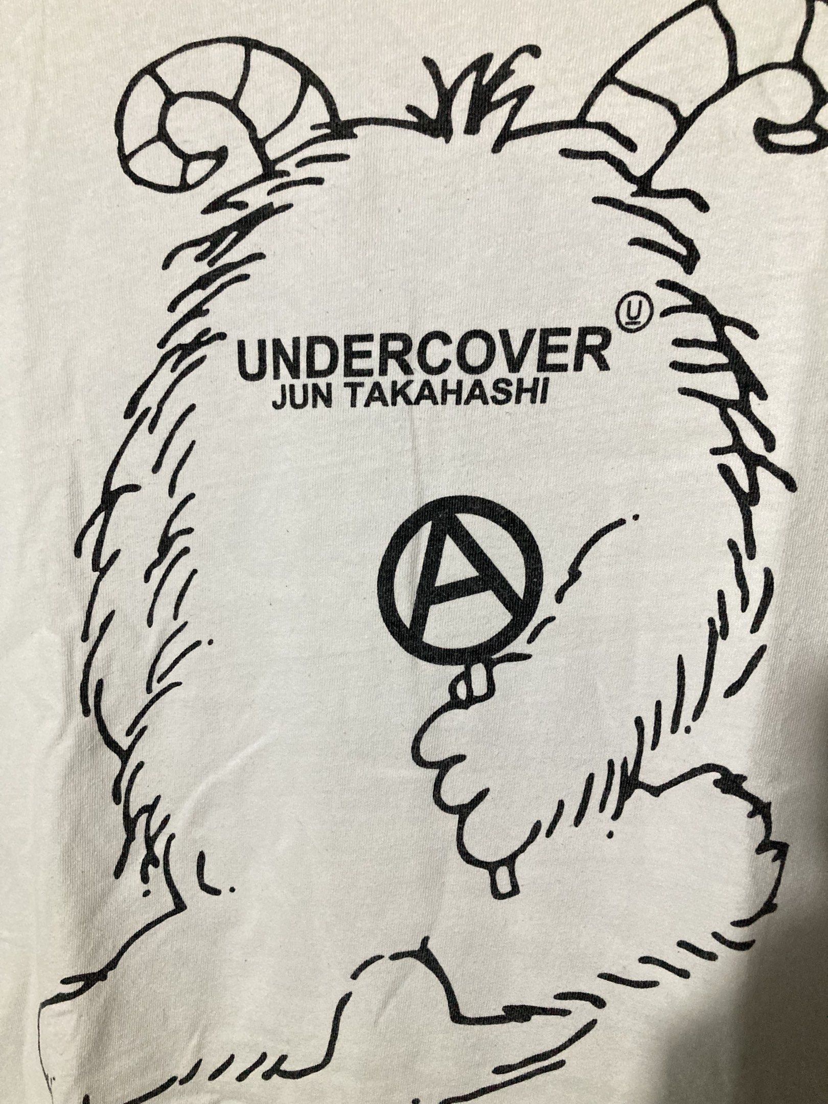 UNDERCOVER JUN TAKASHI ANARCHY MONSTER SHIRT (Category: Luxury Apparel) located in Naga. Submitted by wwy3ips (Listing ID 1411261259, Image 3). Description: UNDERCOVER JUN TAKASHI ANARCHY MONSTER TSHIRT SIZE 3 ON TAG 19 WIDTH 26 LENGTH IN VERYGOOD CONDITION 9/10 COLOR RATE NO ISSUE .