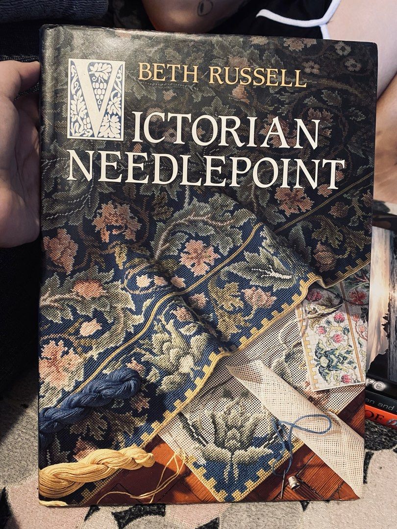 Victorian Needlepoint by Beth Russell (Category: Storybooks) located in Manila. Submitted by bookcartelhub (Listing ID 1422146346, Image 1). Description: Book, "Victorian Needlepoint" by Beth Russell, features a collection of exquisite designs based on the Arts and Crafts Movement. It includes stitch-by-stitch charts, full color, and suggestions for needle size and canvas mesh. The book provides information on framing up and basic techniques, enc