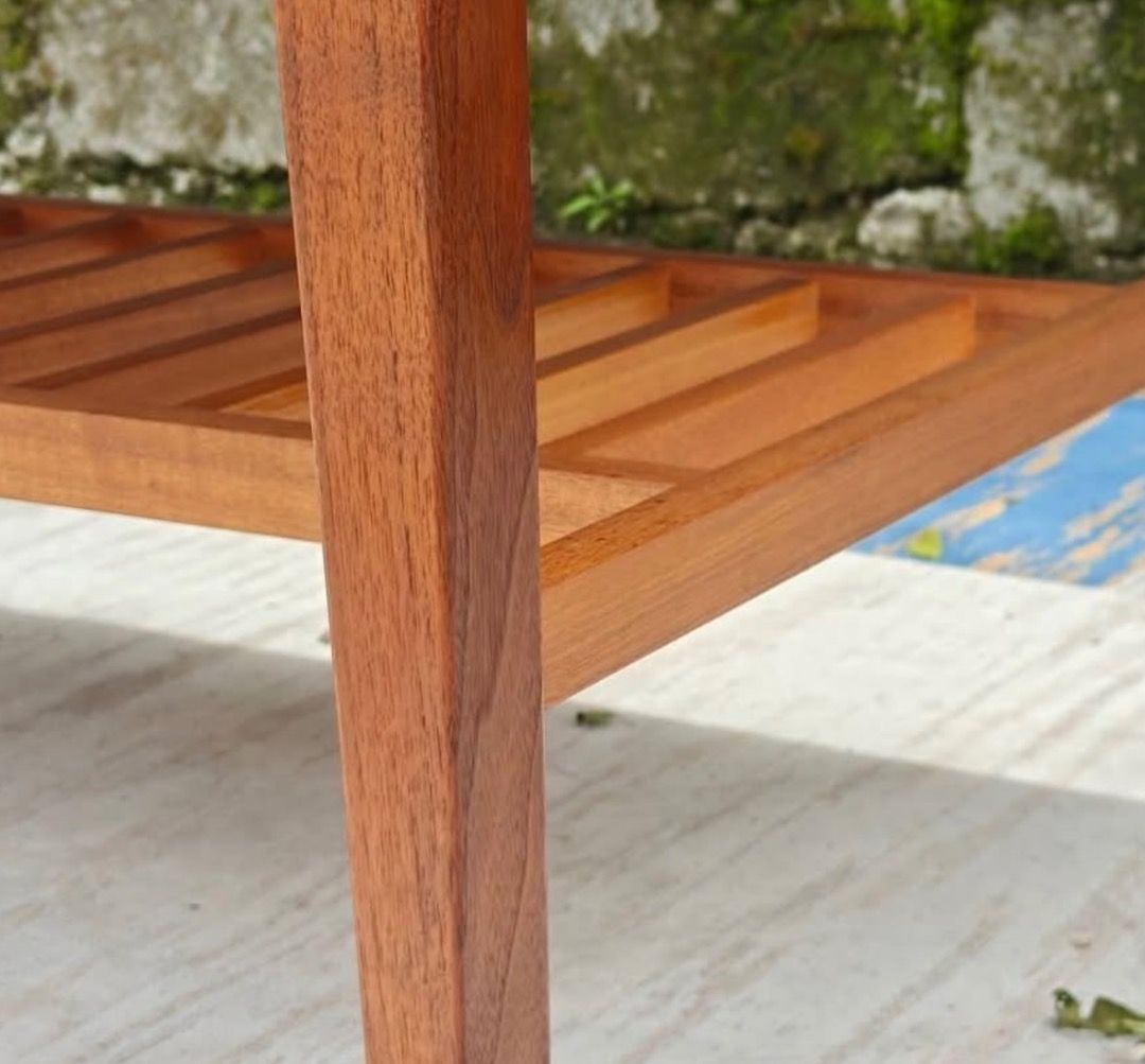Wooden Coffee Table with Shelf (Category: Tables & Sets) located in Mandaluyong City. Submitted by marcker (Listing ID 1422170999, Image 3). Description: - Solid wooden coffee table - Warm, natural finish - Includes a lower shelf for storage - Rectangular top with sturdy legs - Visible wood grain for a classic look - Ideal for living rooms and lounges - L96cm x H45cm x W66cm - Highly negotiable.