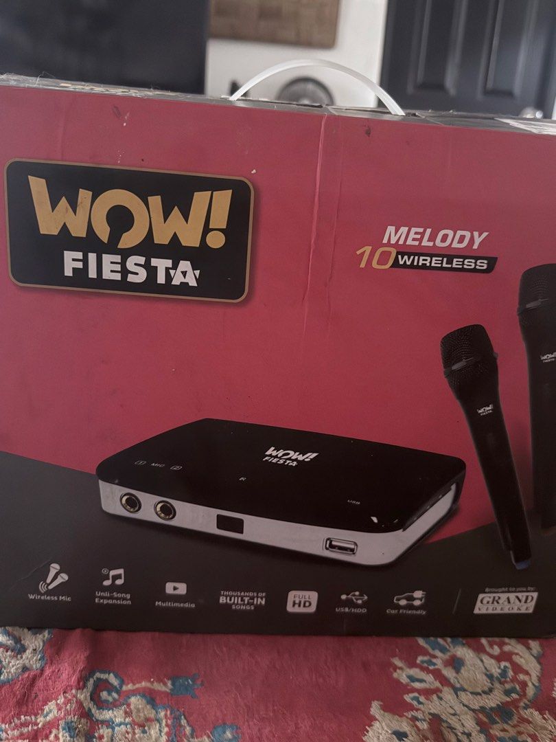 WOW! Fiesta Melody 10 Wireless Karaoke System (Category: Soundbars, Speakers & Amplifiers) located in Dasmarinas. Submitted by 2018_jac (Listing ID 1422098943, Image 1). Description: - Wireless karaoke system - Includes wireless mics - Multimedia capabilities - Built-in songs - Supports USB/HDD - Car-friendly - Full HD video output.