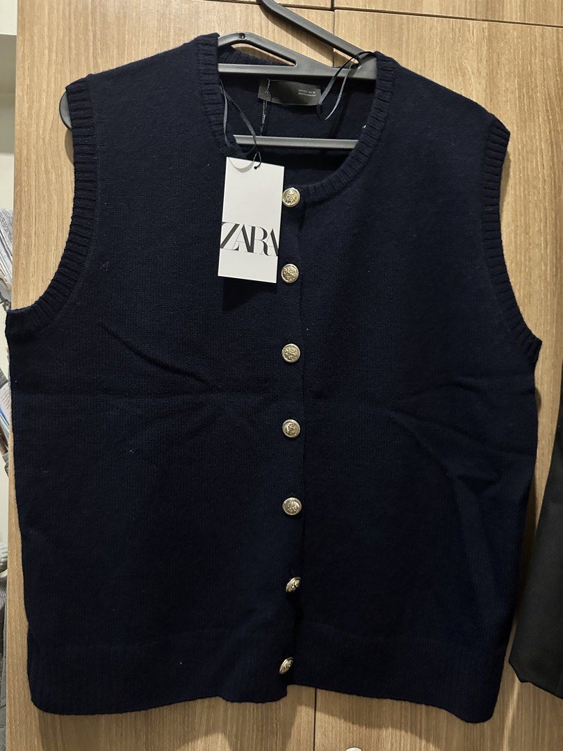 Zara wool vest in navy blue (Category: Blouses) located in Mandaluyong City. Submitted by declutterstuff12 (Listing ID 1422217095, Image 1). Description: With gold button Srp: 2795 Brand new with tag.