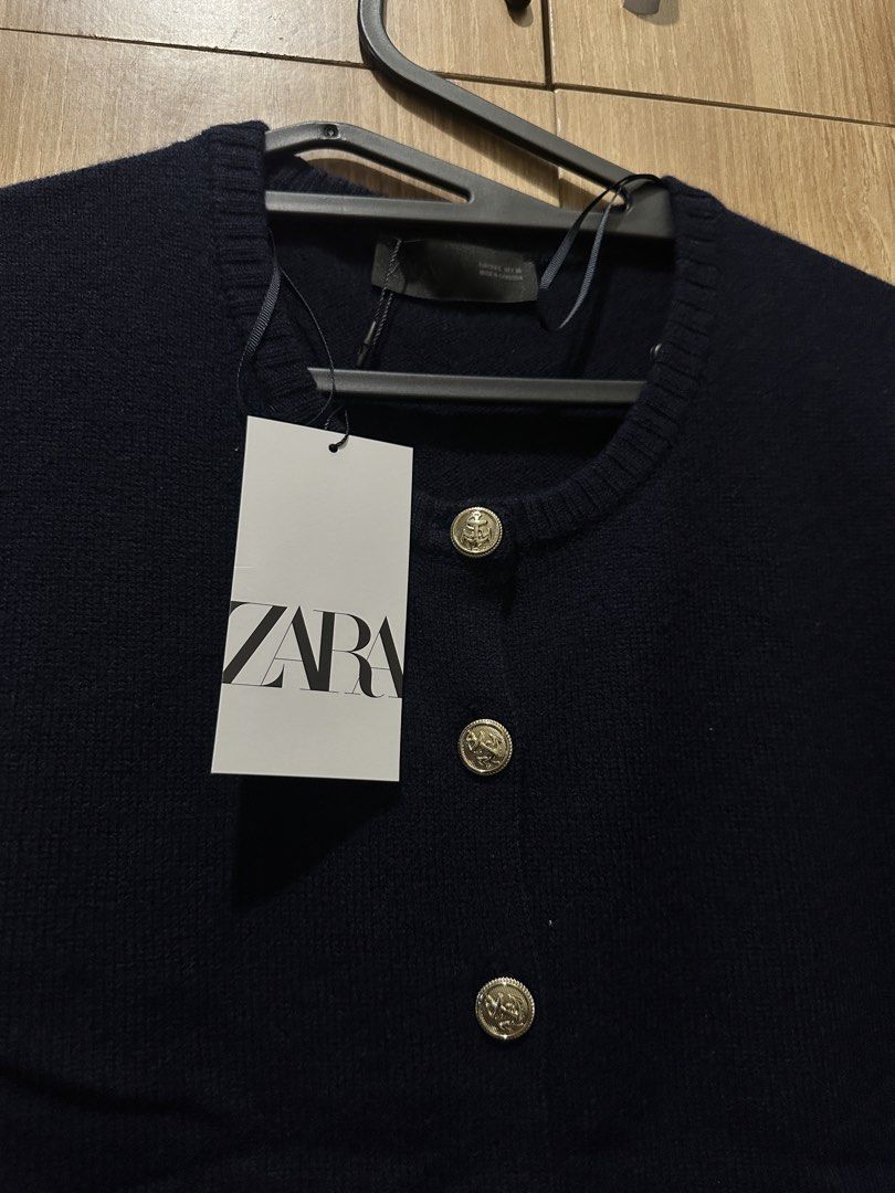 Zara wool vest in navy blue (Category: Blouses) located in Mandaluyong City. Submitted by declutterstuff12 (Listing ID 1422217095, Image 2). Description: With gold button Srp: 2795 Brand new with tag.