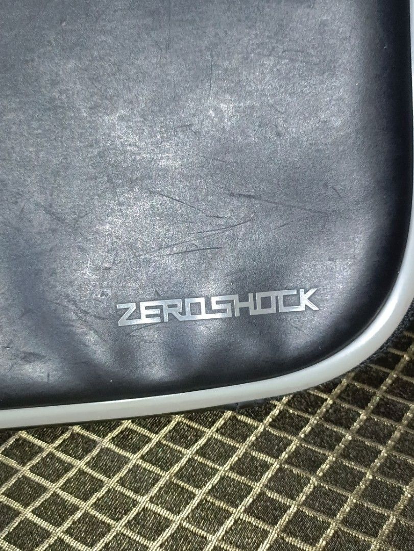 Zero Shock Laptop Sleeve (Category: Laptop Bags & Sleeves) located in San Pedro. Submitted by elevens_online_thrift_shop (Listing ID 1422107218, Image 1). Description: Zero Shock laptop sleeve features a black exterior with a white trim and a zipper closure. The interior is padded for added protection. It has a front pocket for accessories. The sleeve is designed to protect your laptop from shocks and impacts. The Zero Shock logo is visible on th