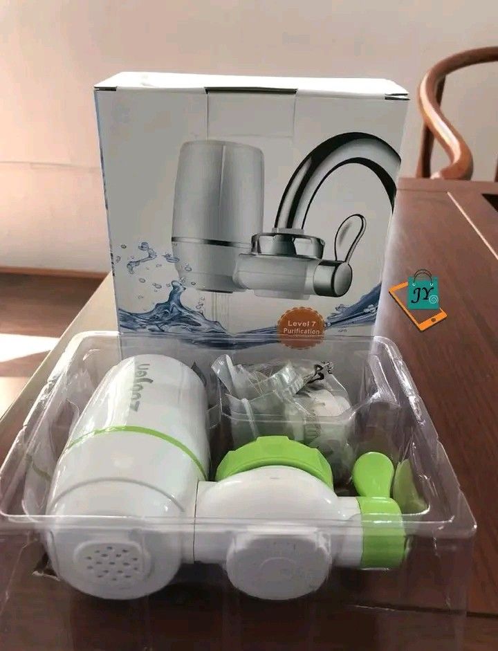 Zoojen Water Faucet Purifier (Category: Water Purifiers & Dispensers) located in Manila. Submitted by ashleyeshk1320 (Listing ID 1422104592, Image 3). Description: - Zoojen Water Faucet Purifier - Level 7 Purification - Includes: Purifier, Adapters, User Guide - Easy Installation - Color: White and Green.