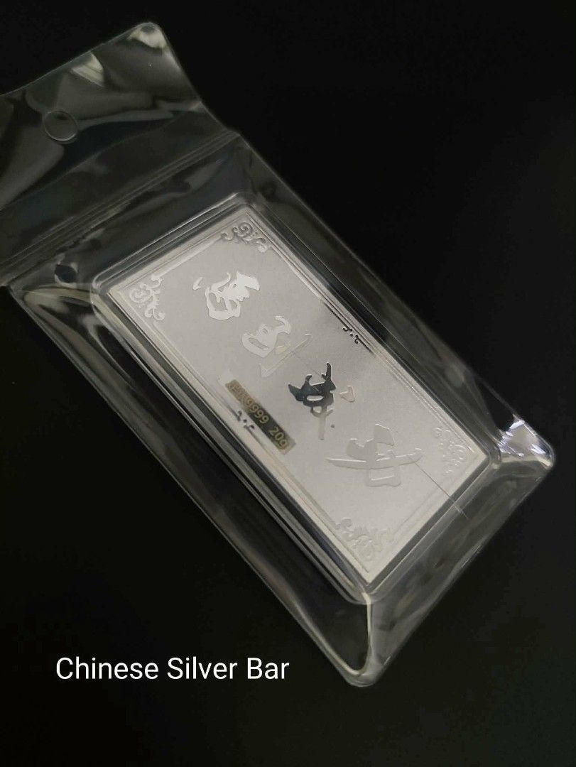 999.9% Silver Bar 20g/100g (Category: Currency) located in Manila. Submitted by primejewelry (Listing ID 1422237504, Image 1). Description: - Available: 20g and 100g silver bars - 100g Bar: Emirates Gold, 999.0 purity - 20g Bars: Feature Chinese characters - Both bars are sealed in protective packaging - Ideal for collectors and investors.