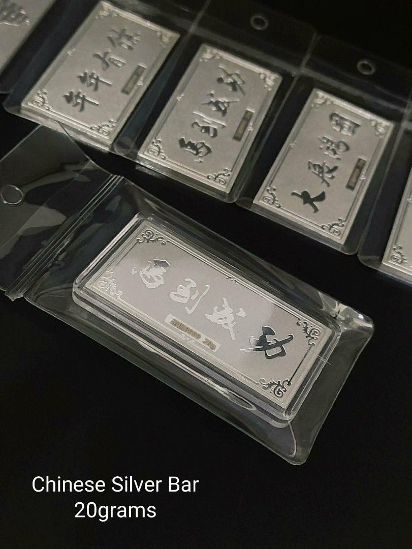999.9% Silver Bar 20g/100g (Category: Currency) located in Manila. Submitted by primejewelry (Listing ID 1422237504, Image 3). Description: - Available: 20g and 100g silver bars - 100g Bar: Emirates Gold, 999.0 purity - 20g Bars: Feature Chinese characters - Both bars are sealed in protective packaging - Ideal for collectors and investors.