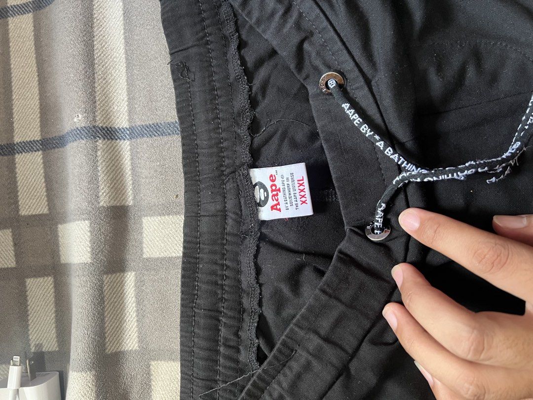 Aape by A Bathing Ape Shorts - Black - Jorts (Category: Shorts) located in Tayug. Submitted by elk.haki (Listing ID 1422307064, Image 3). Description: - Aape by A Bathing Ape shorts - Color: Black - Size: XXXL on tag, pero pasok pang jorts ng m-L - Features: - Drawstring waist - Cargo pockets with Aape logo - Small zip pocket - Aape logo on the side.