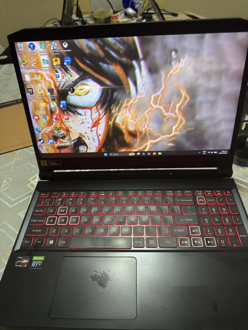 Acer Nitro 5 Gaming Laptop (Category: Laptops & Notebooks) located in Caloocan City. Submitted by johnmagbits-45063 (Listing ID 1422327810, Image 1). Description: - Acer Nitro 5 gaming laptop - Red backlit keyboard - Multiple ports: HDMI, USB, USB-C - Sleek black finish - Custom wallpaper - AMD Ryzen sticker - Cooling vents on the bottom RFS: May PC nako and di ko need masyado ng laptop I only used this during my IT days. Acer Nitro 5 AN515-45-R7
