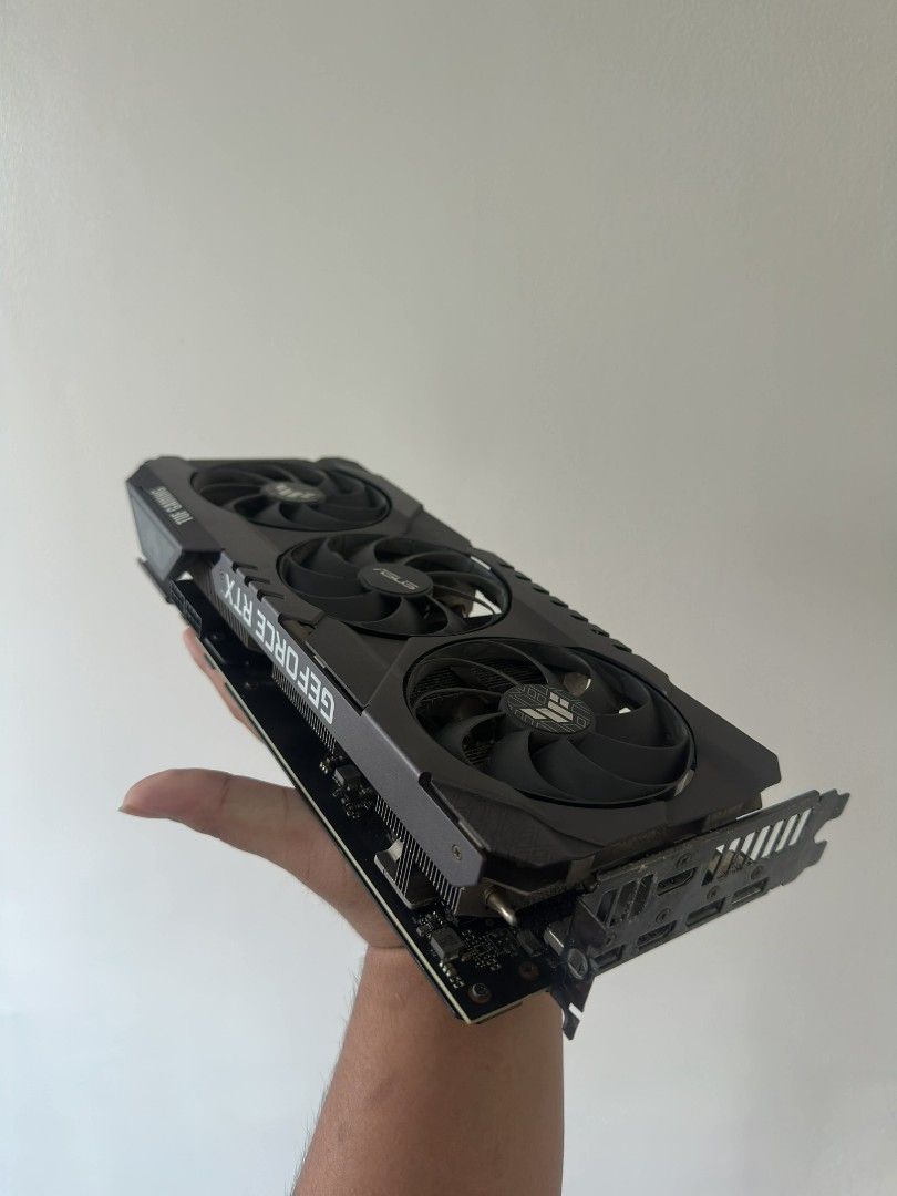 ASUS TUF Gaming GeForce RTX 3070 (Category: Computer Parts) located in Valenzuela. Submitted by mattyu101 (Listing ID 1422366910, Image 1). Description: FOR SALE OR SWAP - ASUS TUF Gaming GeForce RTX 3070 graphics card - Equipped with three fans for optimal cooling - Features the powerful GeForce RTX 3070 - Sleek black design with the TUF Gaming logo - Multiple ports for versatile display connectivity.