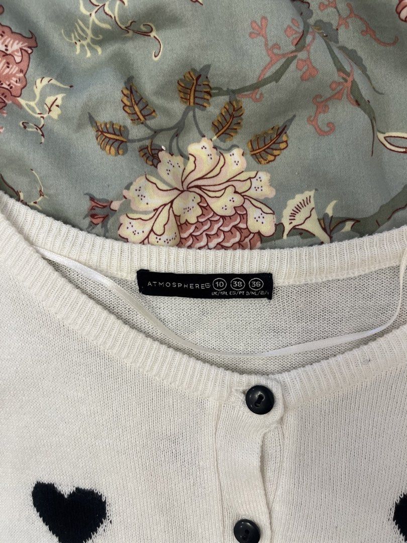 Atmosphere Heart Print Cardigan (Category: Coats, Jackets and Outerwear) located in Quezon City. Submitted by matchaprincess33 (Listing ID 1422319793, Image 2). Description: - White cardigan with black heart print - Button-down closure - Long sleeves - Brand: Atmosphere - Size: 10 (UK) / 36 (EUR) / 36 (USA).