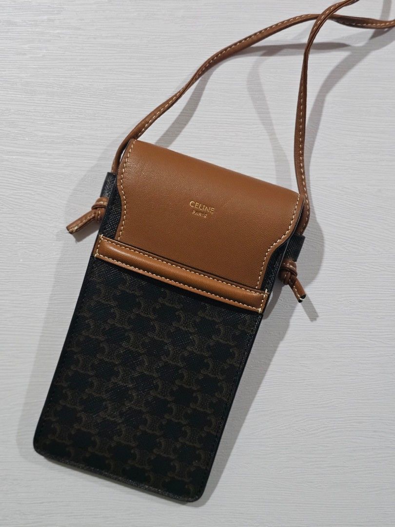Authentic Celine Mobile Phone Pouch (Category: Luxury Bags & Wallets) located in Binan City. Submitted by mommysellsph (Listing ID 1422238682, Image 1). Description: Only used once. Bought for Ph21K Made in Italy.
