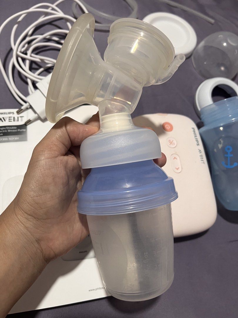 Avent Electric Single Breast Pump (Category: Breastfeeding & Bottle Feeding) located in San Jose del Monte. Submitted by ayezafmb (Listing ID 1422349071, Image 3). Description: Avent Single Electric Breastpump Plus Inclusions: - Complete Set with box - 9-oz milk bottle (free) - Refill cup (free) - Conversion cup (free) - Natural Nipples (brandnew) * Breastpump and accessories almost new. Barely used as my baby prefers to latch directly to me. * B