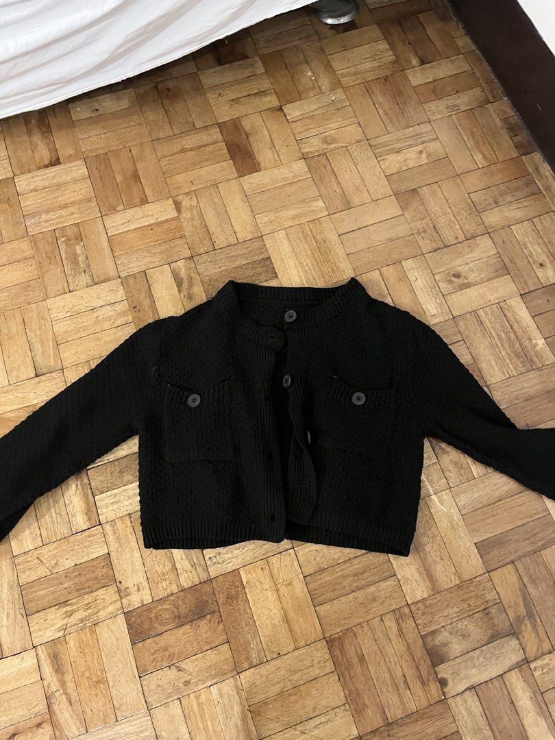 Black Cardigan (Category: Coats, Jackets and Outerwear) located in Manila. Submitted by desanddat (Listing ID 1422369265, Image 2). Description: - Black cropped cardigan - Round neckline - Button-down closure - Long sleeves - Textured knit fabric - Versatile style.